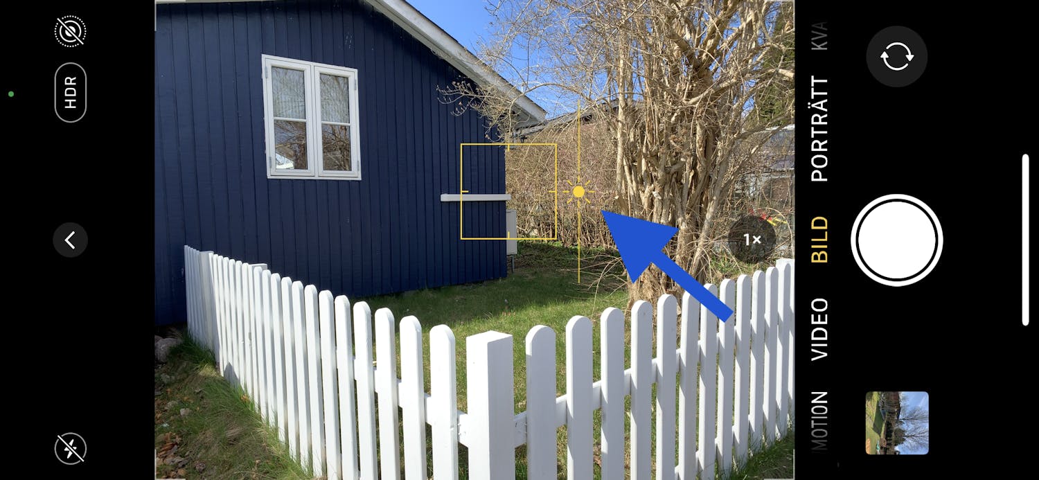 Flytta på solen iPhone-kamera visar trähus